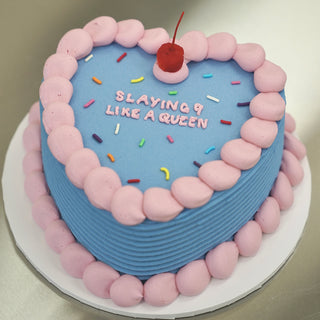 Sprinkle vintage cake with a cherry on top 